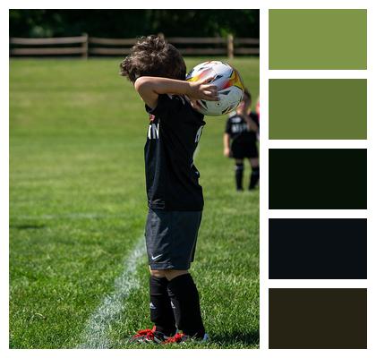 Sports Child Field Throwin Image