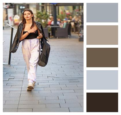 Woman Walking Sidewalk Image