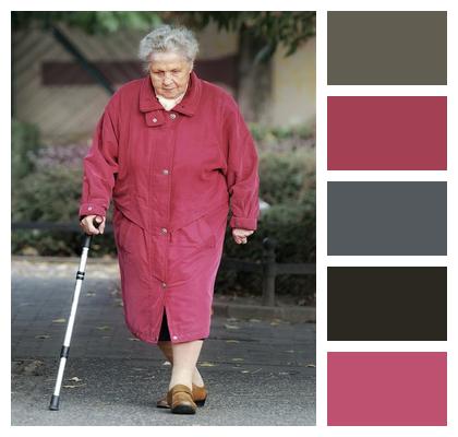 Walking Woman Overcoat Walking Stick Image