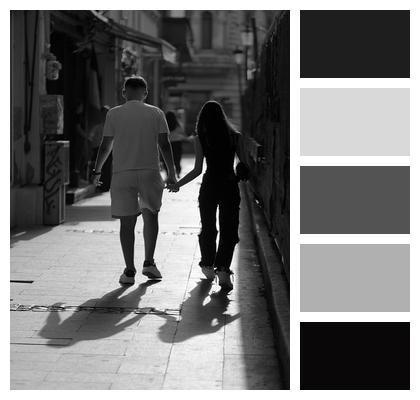 Walking Sunny Couple Holding Hands Image