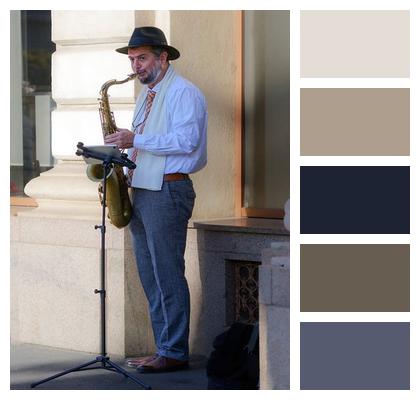 Saxophone Outdoors Hat Playing Image