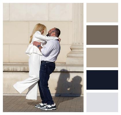 Urban Couple Building Posing Image