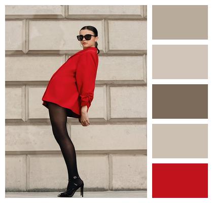 High Heels Timeless Style Confident Woman Cityscape Background Image